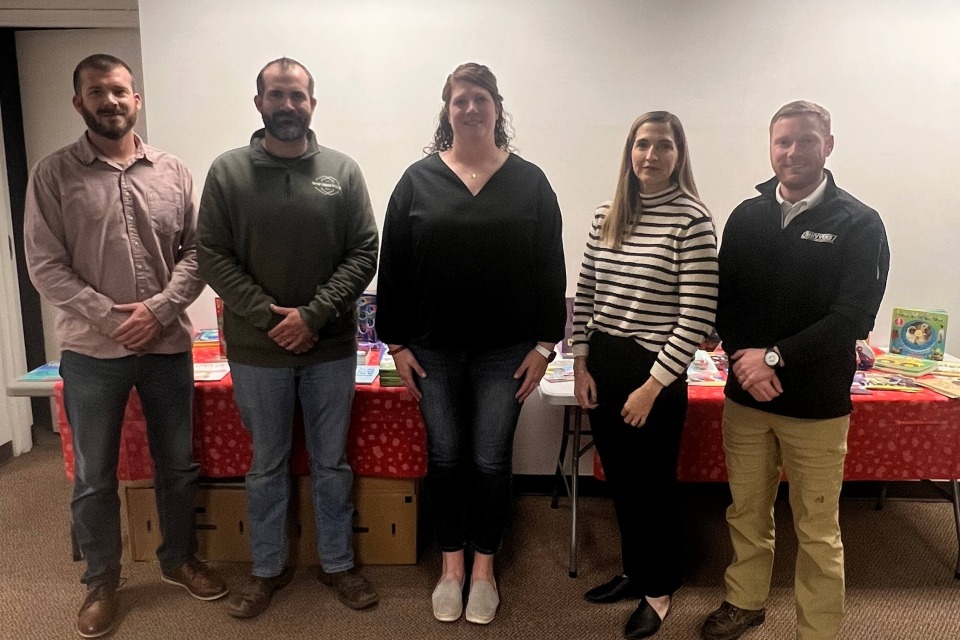 Chariton CSD board members standing together after a school board meeting.